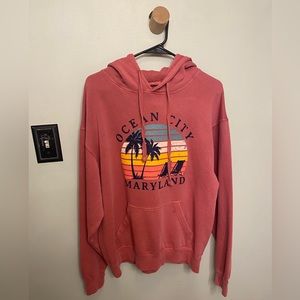 Hoodie detailing ocean city along the front